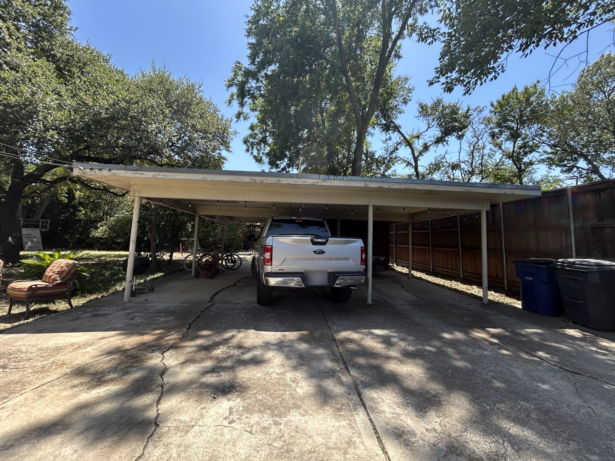 Covered carport and drive