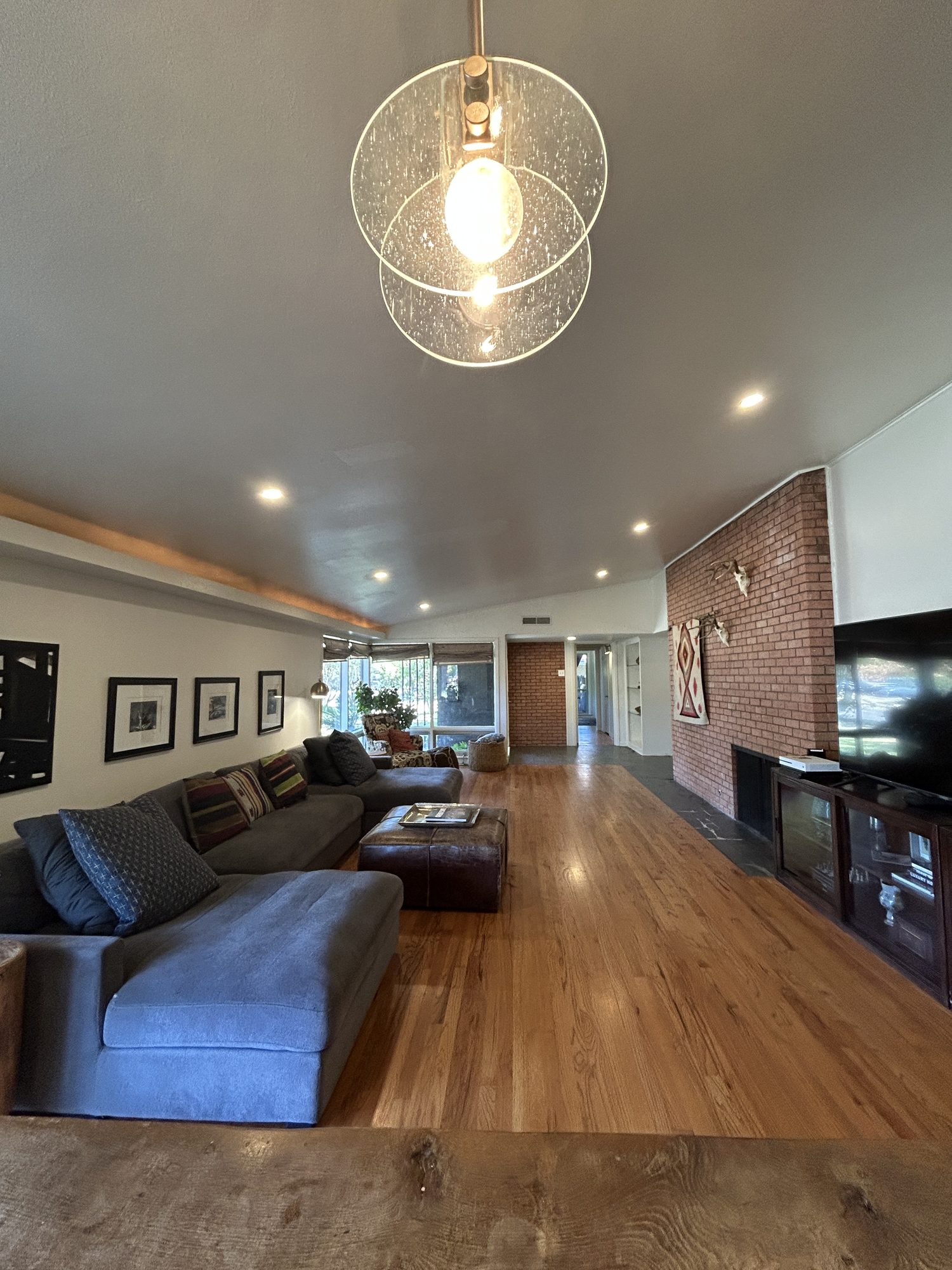 Vaulted living room with beam detail